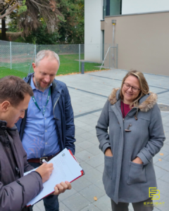 Catherine and James review details with chef de project Kevin