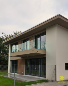 The exterior of the home is a mix of wood and stucco