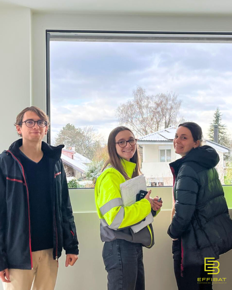 Elorri, Etienne et Marie-Laure in front of a window looking outside